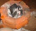 Stove with charcoal.png